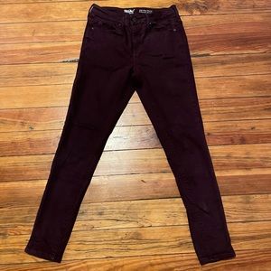 Good used condition dark purple high rise skinny jeans